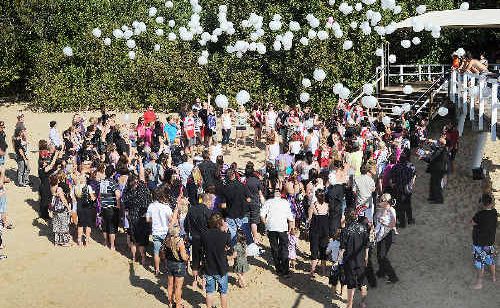 Hundreds gathered on Torquay Beach to honour Hervey Bay teenager Brittney Rose Kelly yesterday. Hundreds gathered on Torquay Beach to honour Hervey Bay teenager Brittney Rose Kelly yesterday.
